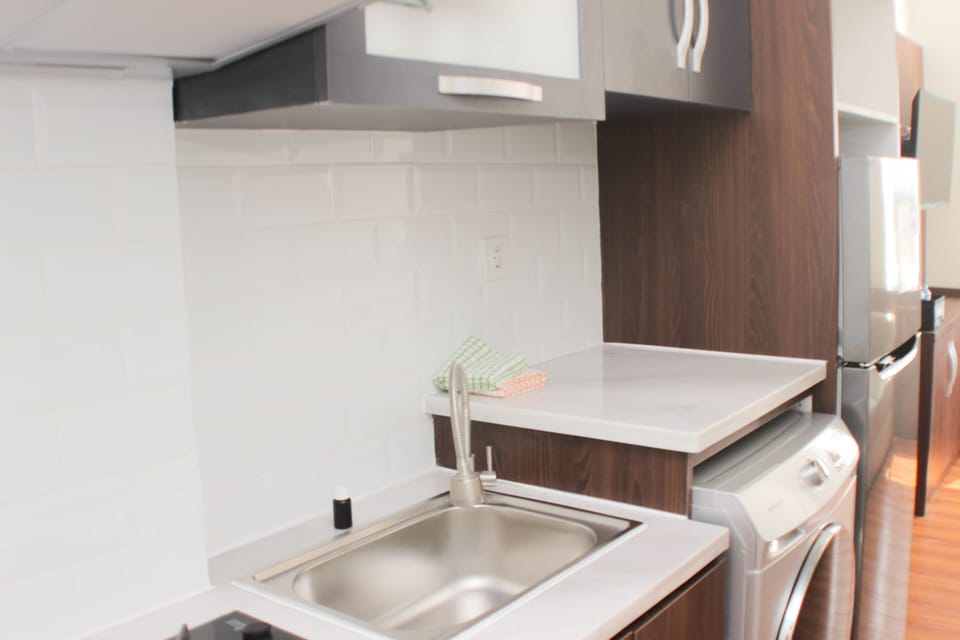Fridge, stovetop, cookware/dishes/utensils, dining tables