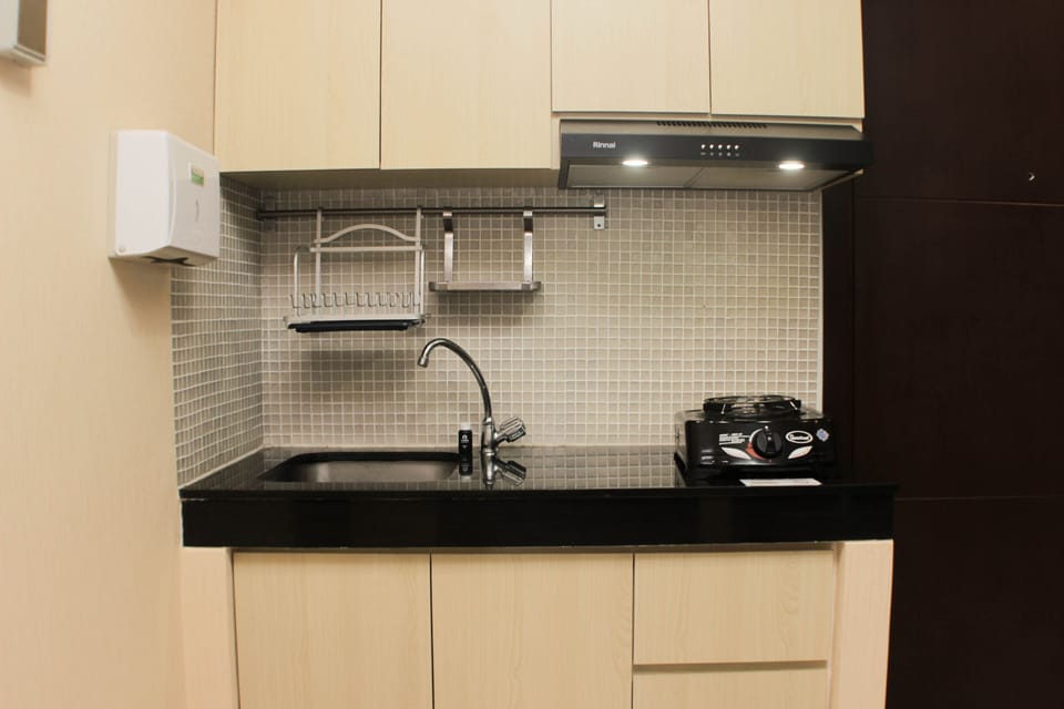 Fridge, stovetop, cookware/dishes/utensils, dining tables