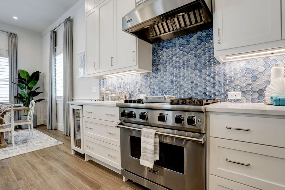 Kitchen offers a gas range with a griddle