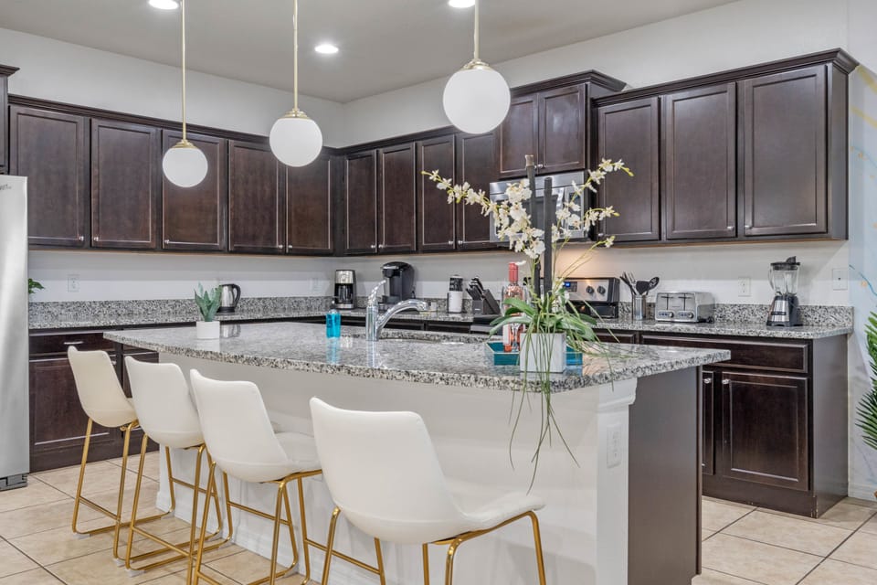 This well stocked kitchen allows you to make meals together anytime.