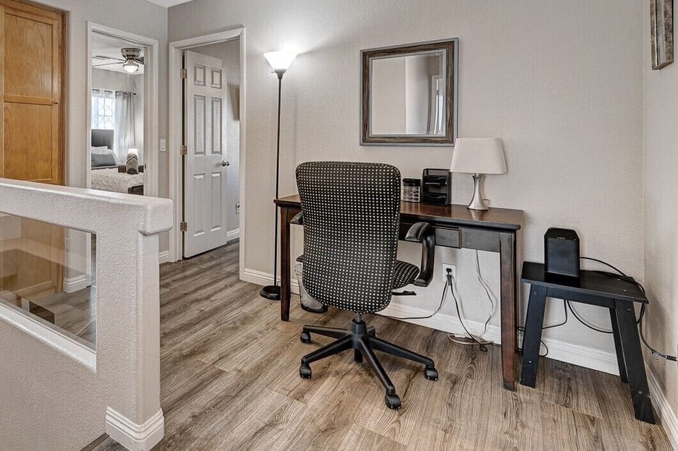 Work station located near second and third bedroom.