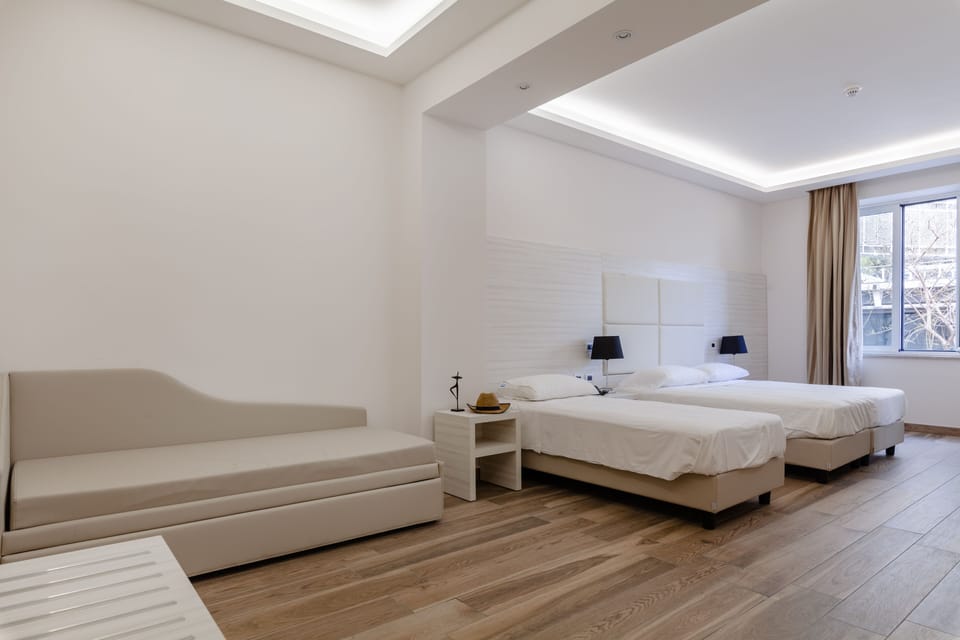Basic Quadruple Room | In-room safe, desk, blackout drapes, soundproofing