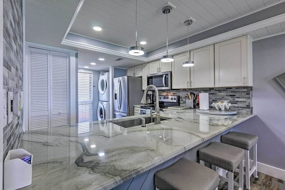 Grab a stool so you can snack & chat with the chef while dinner's being cooked!