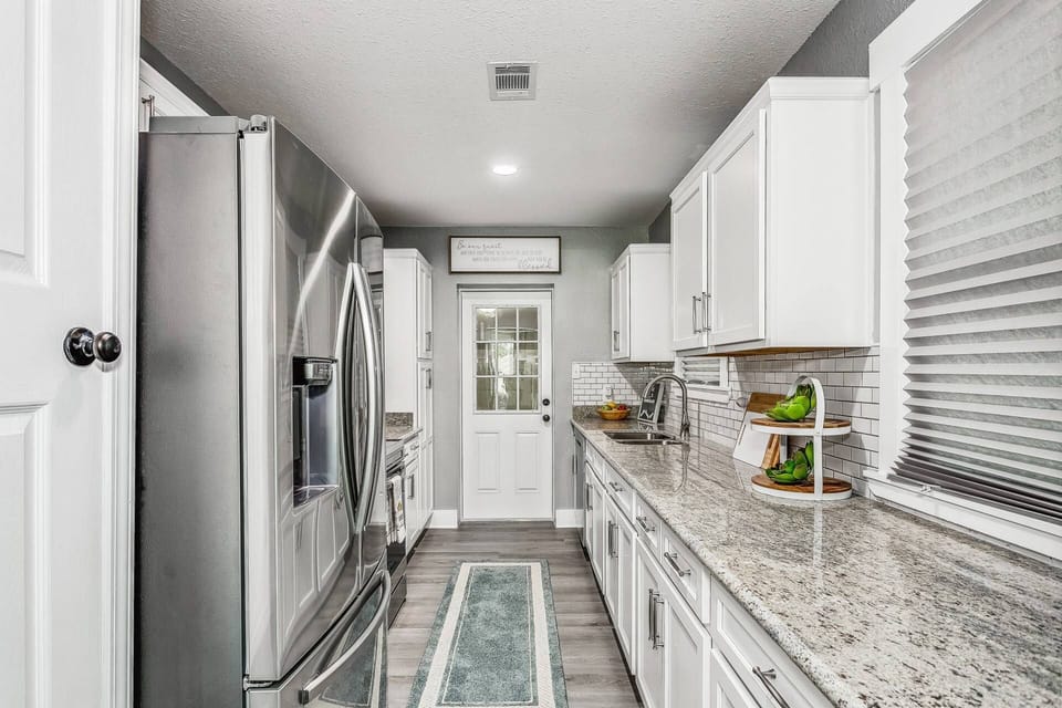 Full galley style kitchen with modern updates
