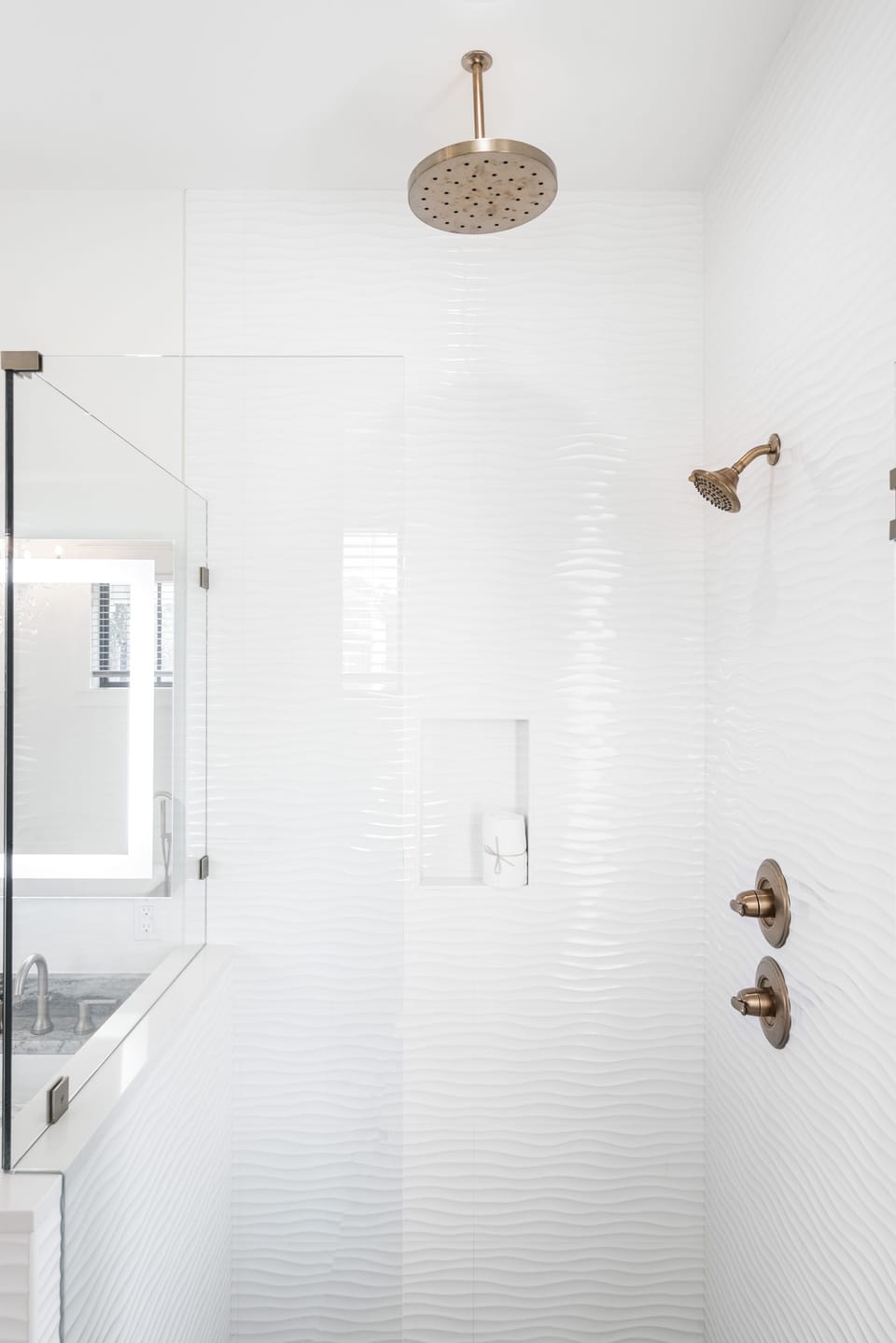 Master Bathroom with Dual Vanities, Custom Fixtures, LED Bathroom Mirror, Waterfall Shower and a Garden Soaking Bathtub with Beaded Chandelier