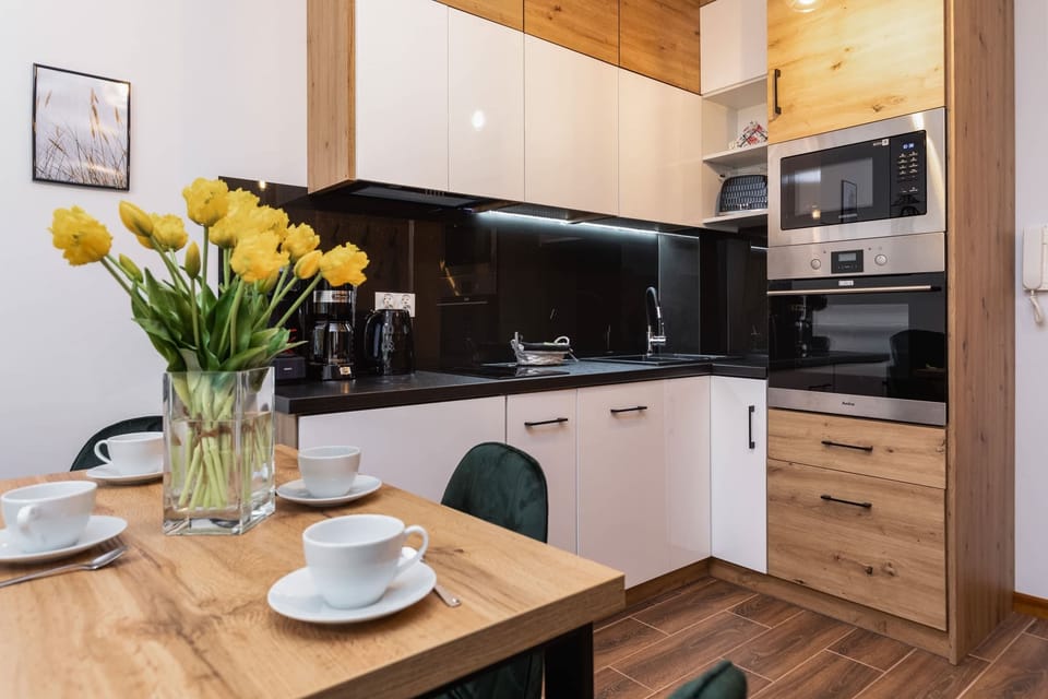 The fully equipped kitchenette includes everything you need for a home-cooked meal.