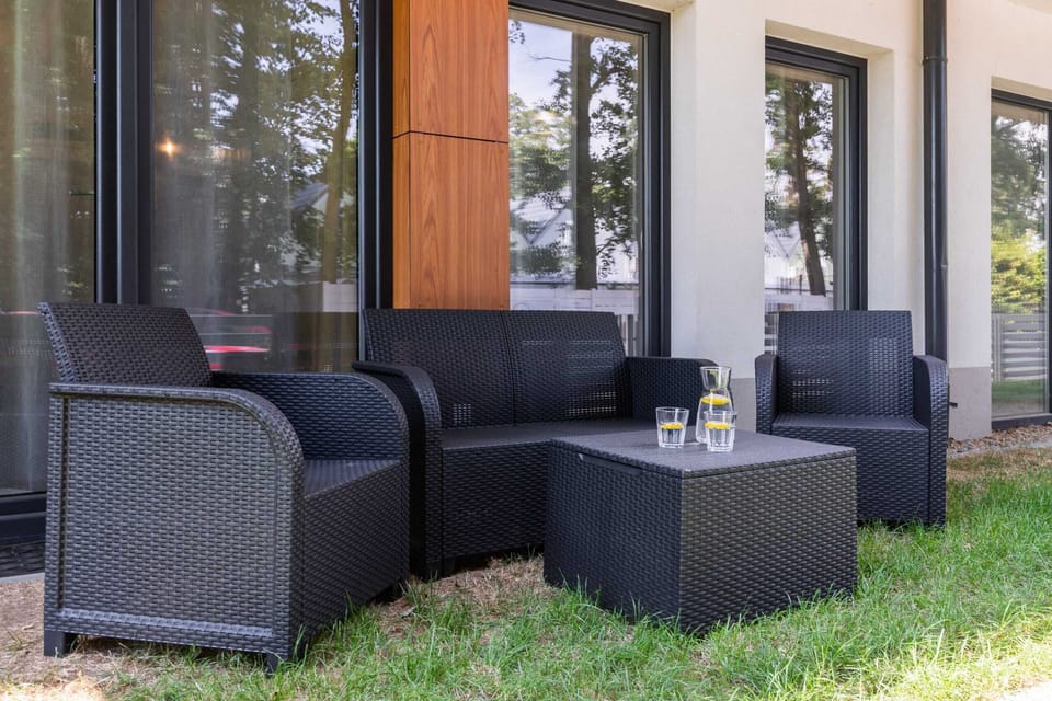 The furnished terrace offers a perfect spot for morning coffee.