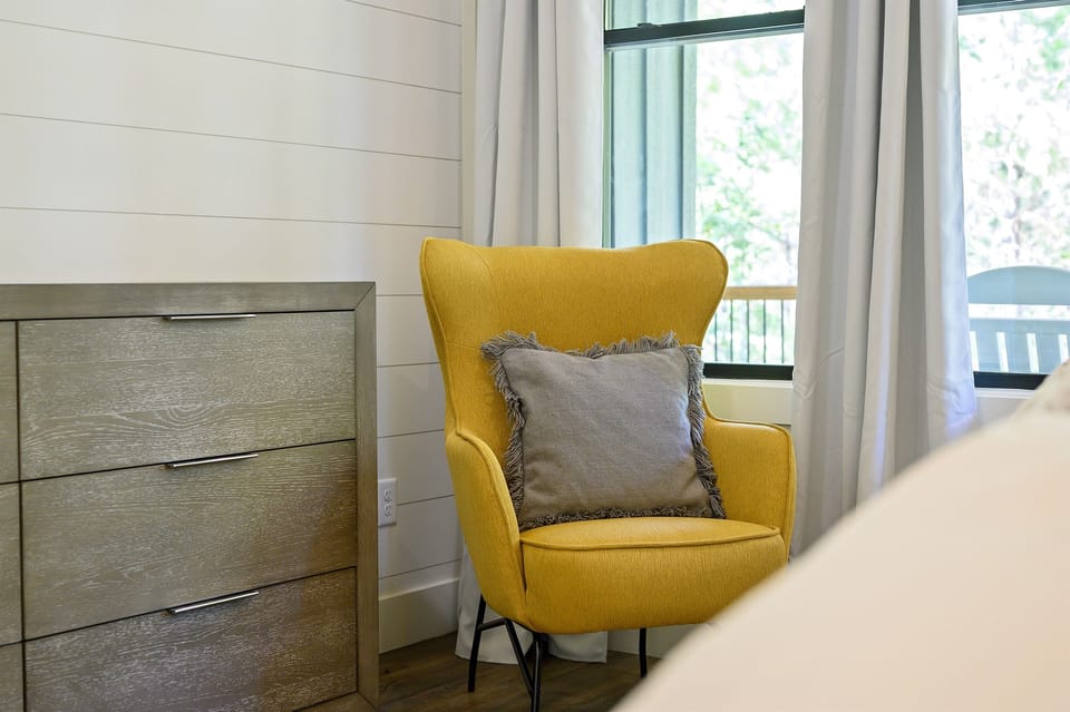 Take a seat in the primary bedroom