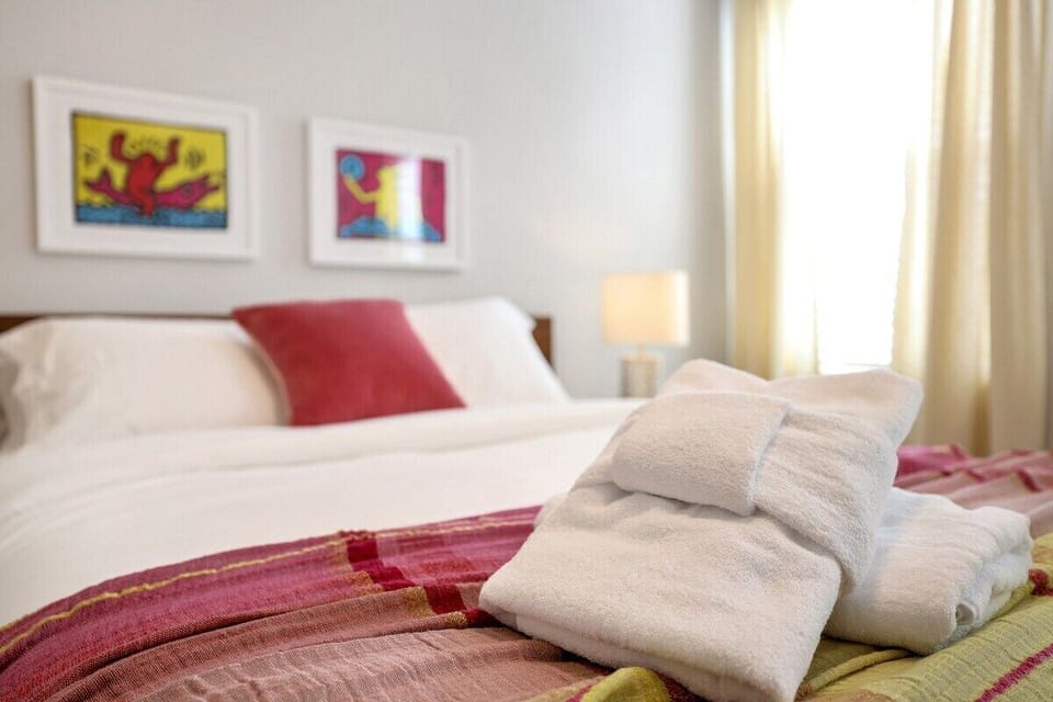 This room has a Queen-size bed, closet and nearby bath.