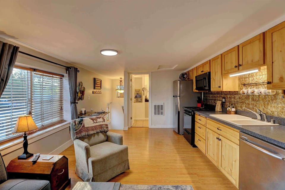 Open layout that keeps everyone connected between the kitchen and living space.