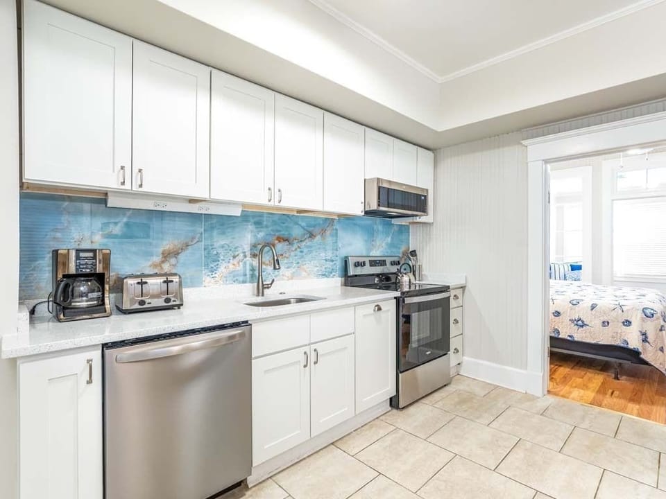 Condo, Multiple Beds, Kitchen, Garden View | Private kitchen | Fridge, microwave, oven, stovetop