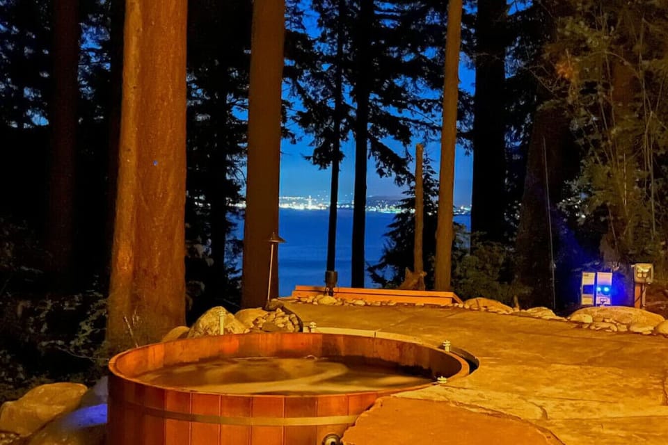 A night-time dip in the cedar hot tub is just what you need to relax and rejuvenate!