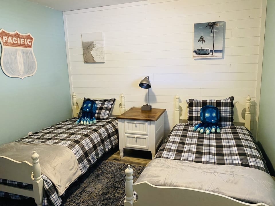 Guest room #2 with two twin beds.