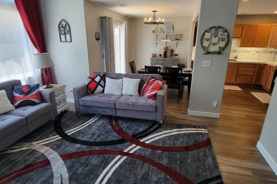 Open Concept view of the Living Room, Dining Room, and Kitchen.