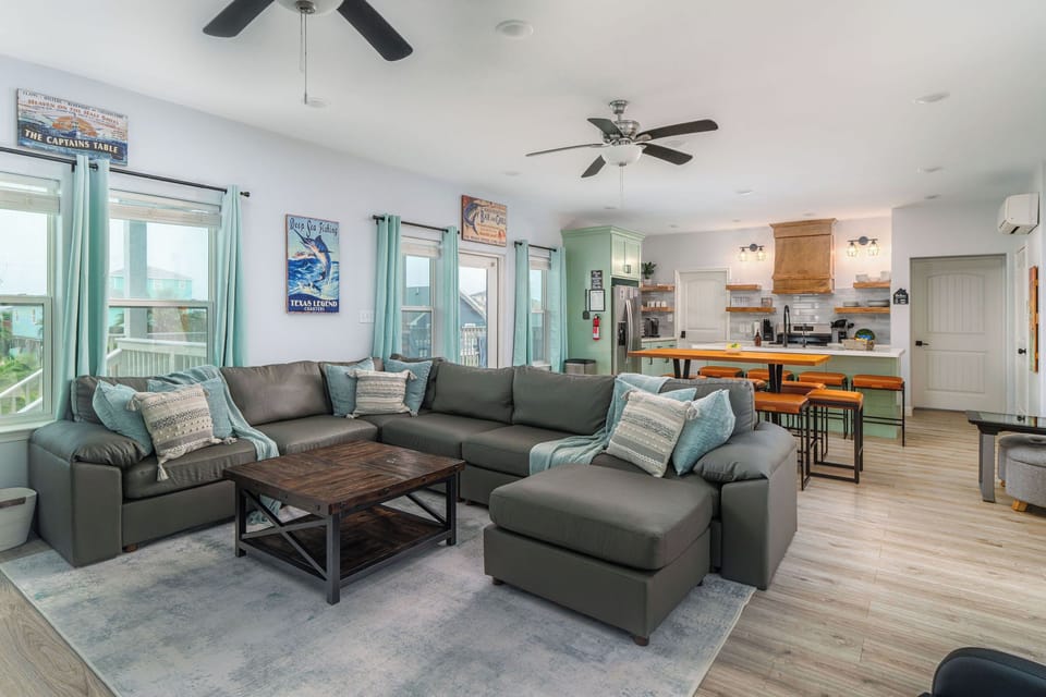 Open-concept living + kitchen so the whole group hangs together. Oversized sectional, wide sight lines, room to breathe