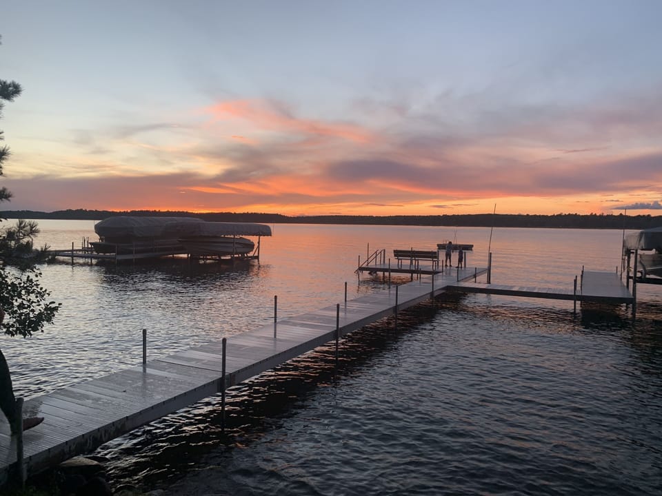 Sunsets are beautiful! Ladder at the end to get out of the lake into the dock. 