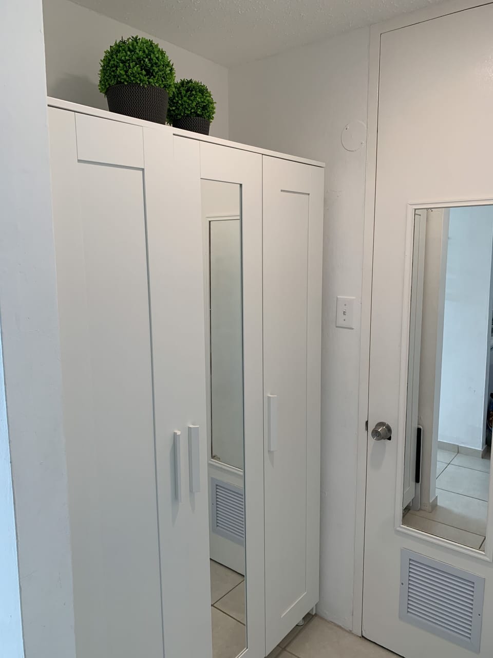 Full Closet (includes iron and board)