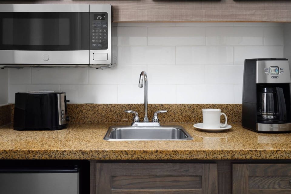 Kitchenette comes in guest bedroom with a king and a sleeper sofa.