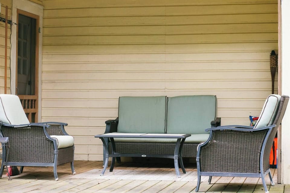 Enjoy a conversation on our back patio!
