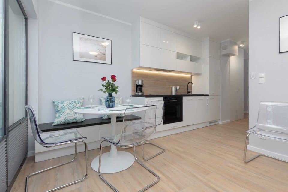 The living room's sleek design is both functional and aesthetically pleasing.