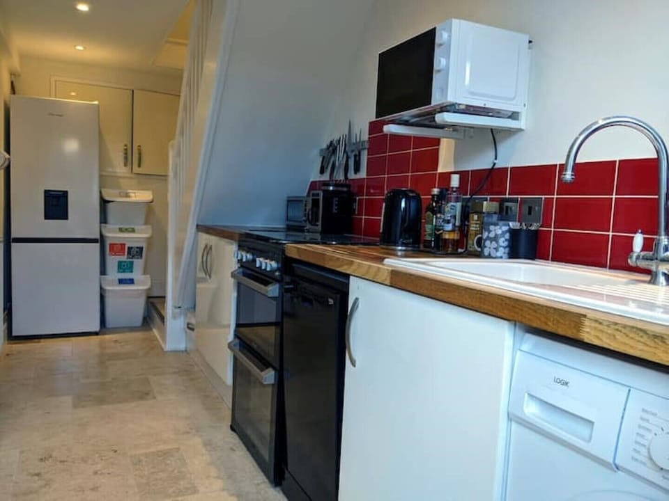 Kitchen: all the necessary amenities including coffee maker.