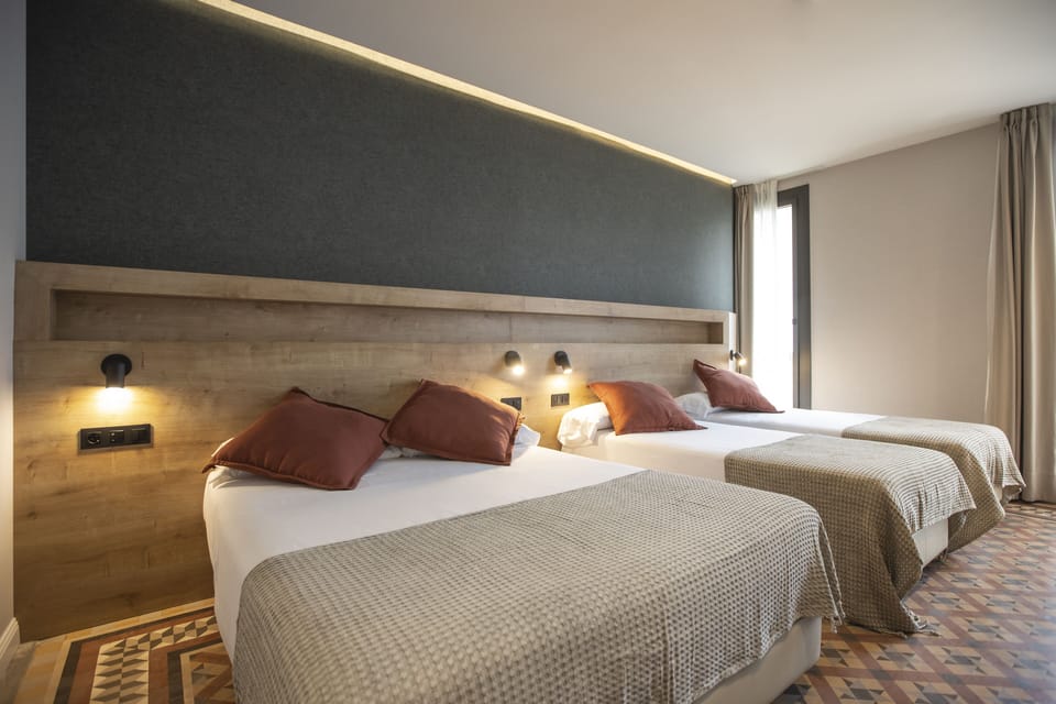 Quadruple Room | Down comforters, memory foam beds, minibar, in-room safe