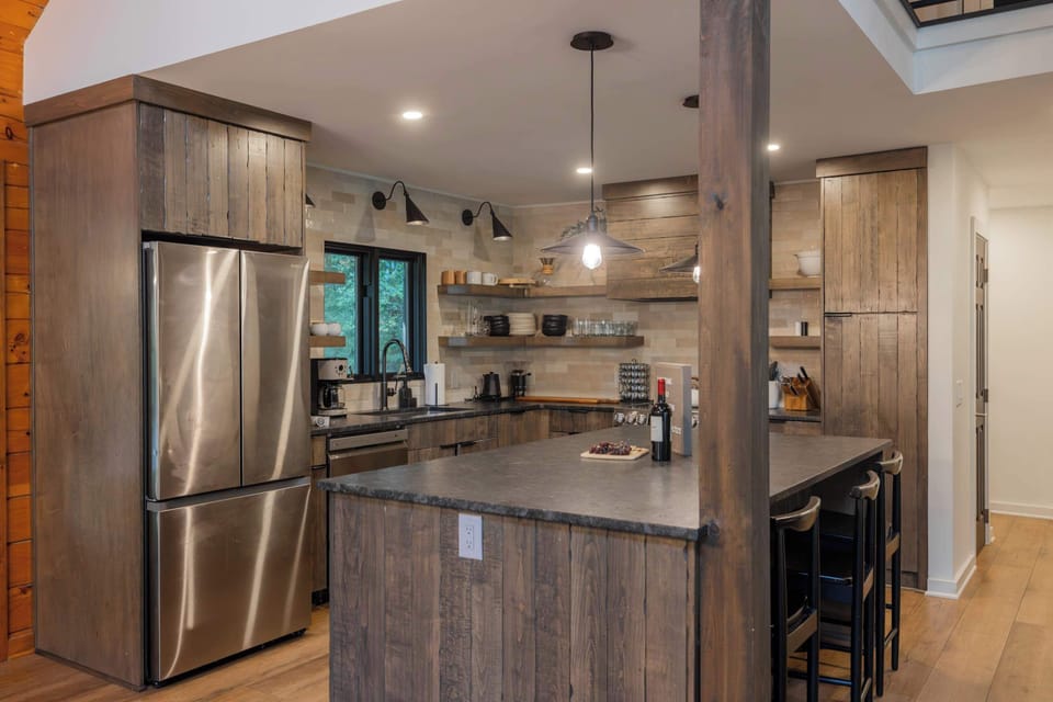 Every modern amenity you need: Keurig, regular coffee maker, spice rack, full cookware, and plenty of counter space for the family chef.
