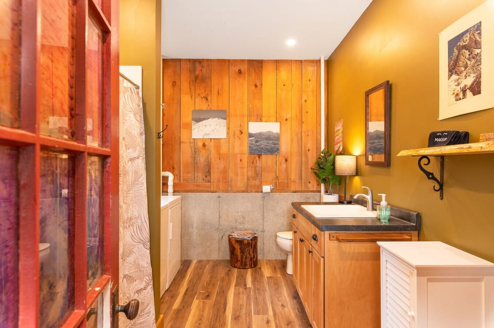 Step into our charming bathroom, adorned with rustic touches and natural elements
