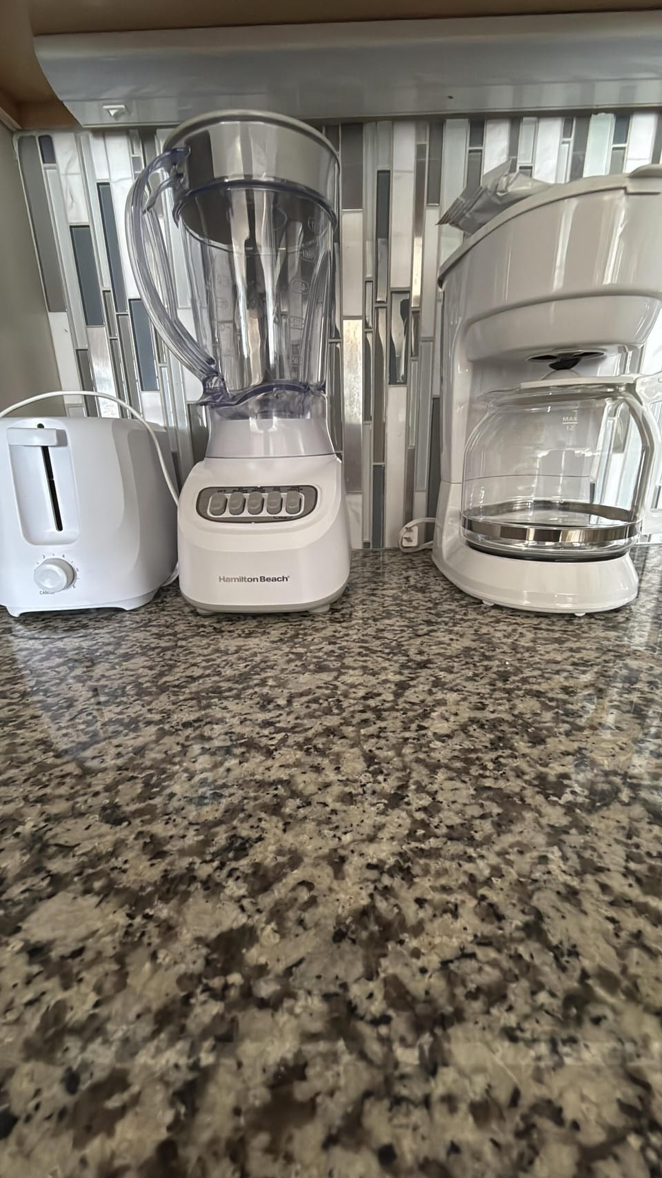 Regular coffee pot, Keurig, Blender and Toaster