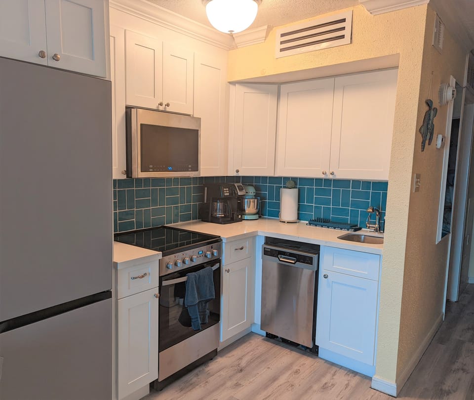 Kitchen stocked with everything you need to cook as much or little as you want. 