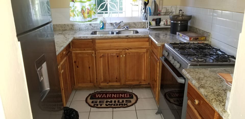 Coffee/tea maker, full-size fridge, electric kettle, mixer