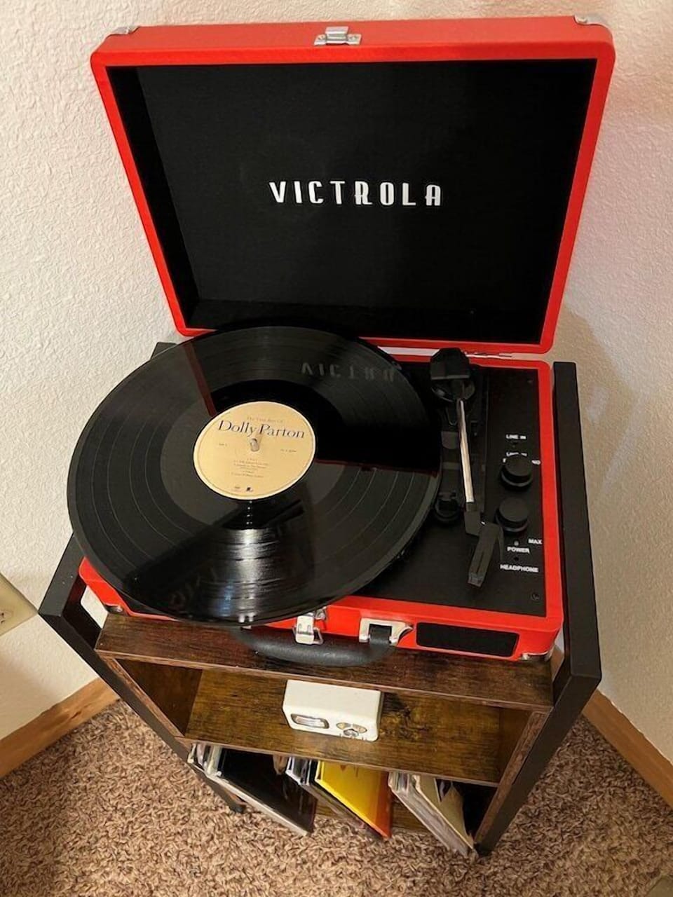 Enjoy a collection of LPs on a vintage record player