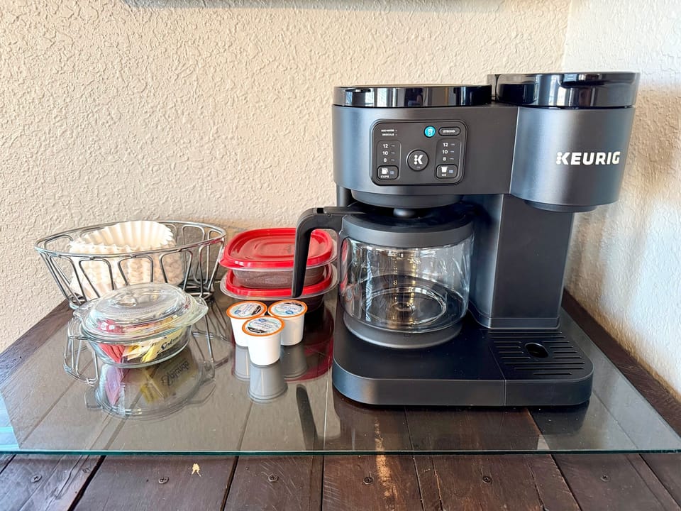 Keurig Duo Essentials coffee maker allows you to brew carafes of drip coffee or brew individual coffee pods.