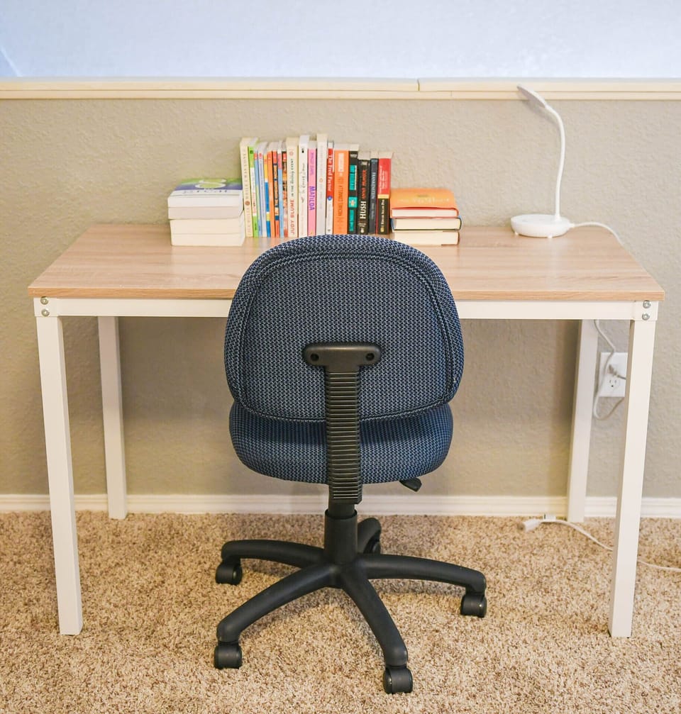 Comfortable work space with books for the family.