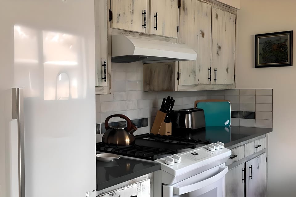 Nice appliances and a well stocked kitchen
