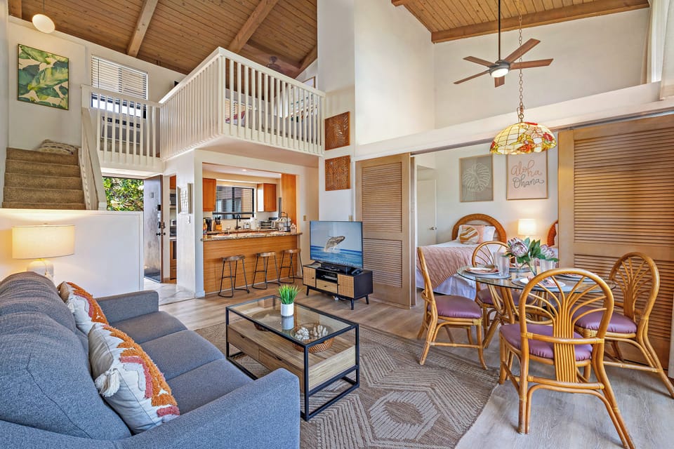The open space concept with the loft in the upper left of the photo.