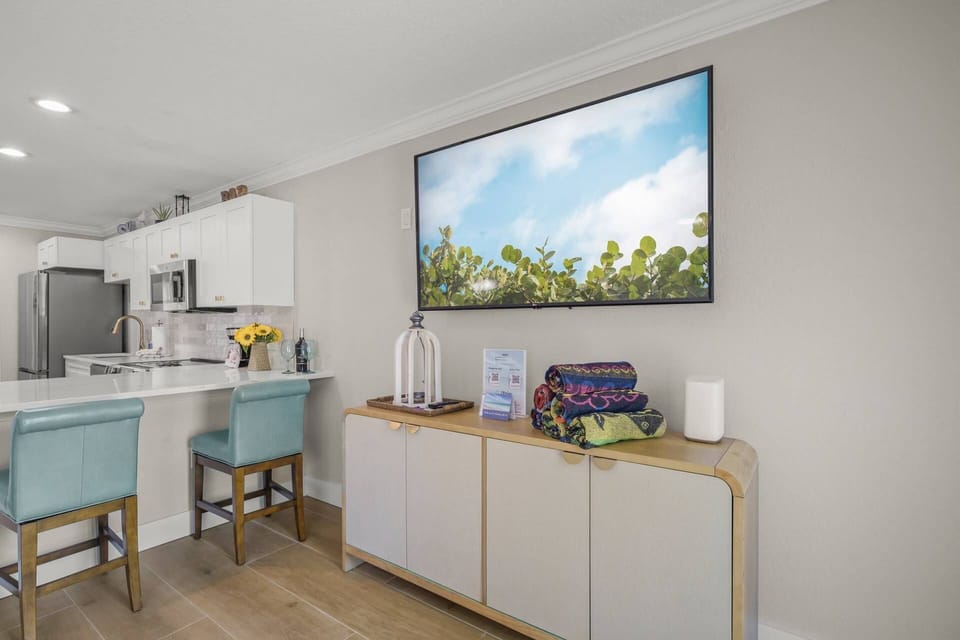Cozy up on the sofa and enjoy a movie night on the wall-mounted TV