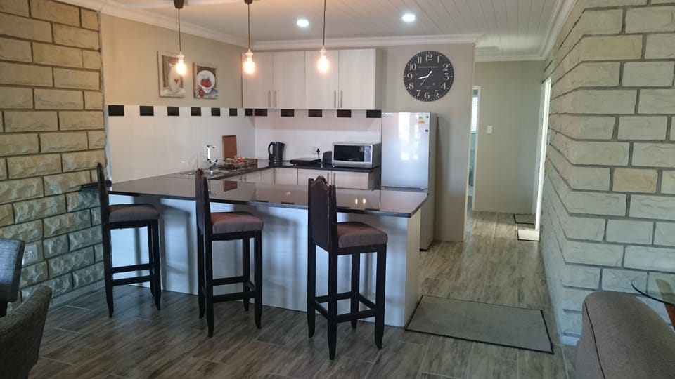 Deluxe Apartment, 1 Bedroom | Private kitchen | Fridge