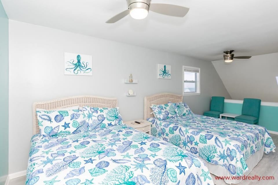 Loft bedroom with 2 queen beds and private bath