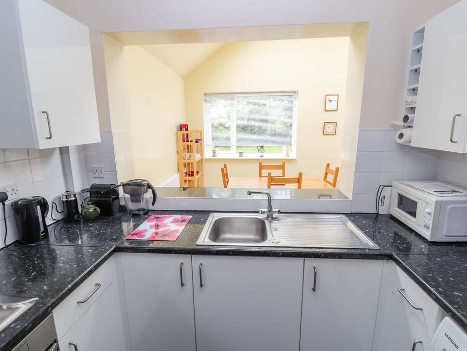 Fridge, electric kettle, toaster, cookware/dishes/utensils