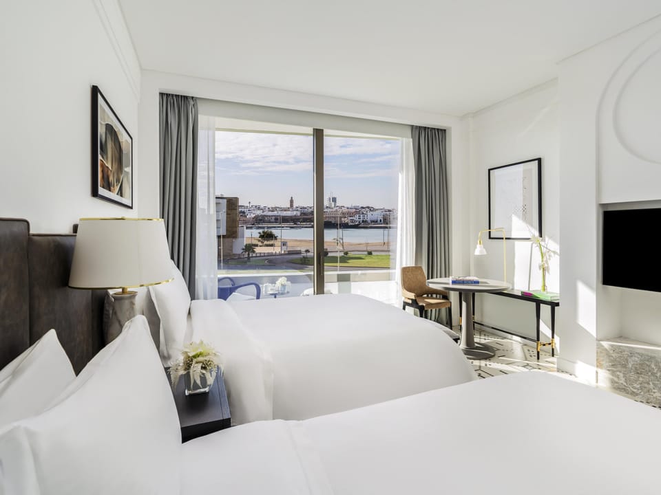 Premium bedding, pillowtop beds, minibar, in-room safe