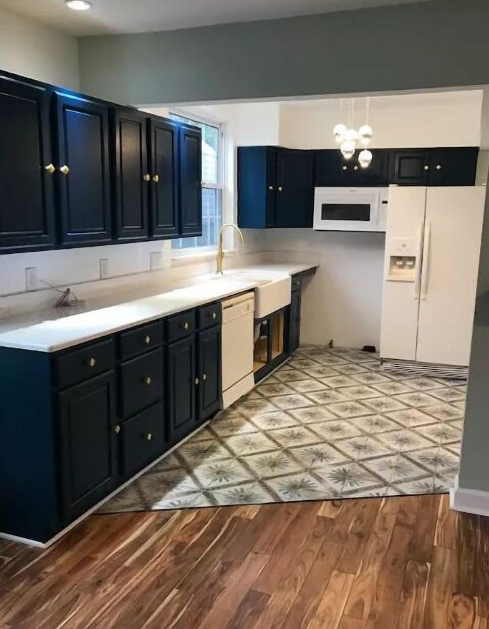 Enjoy plenty of counter space, refrigerator, new gas stove, microwave and more