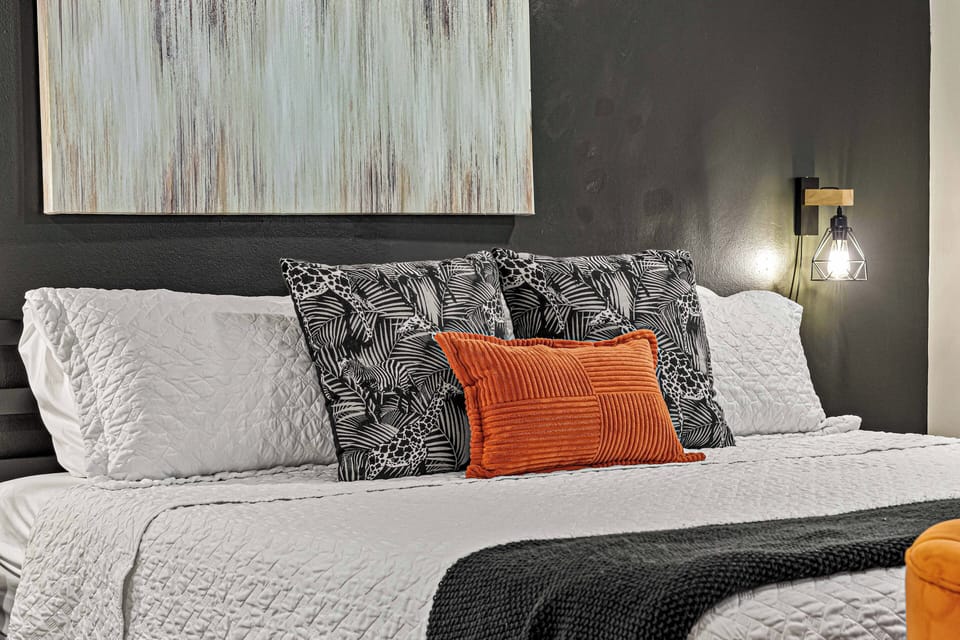 Master suite with king bed, coffee bar & spa-like en suite with glass shower