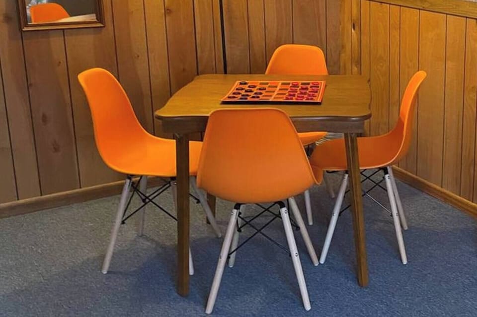Gaming table for four competitors. We offer a wide range of games for all ages.