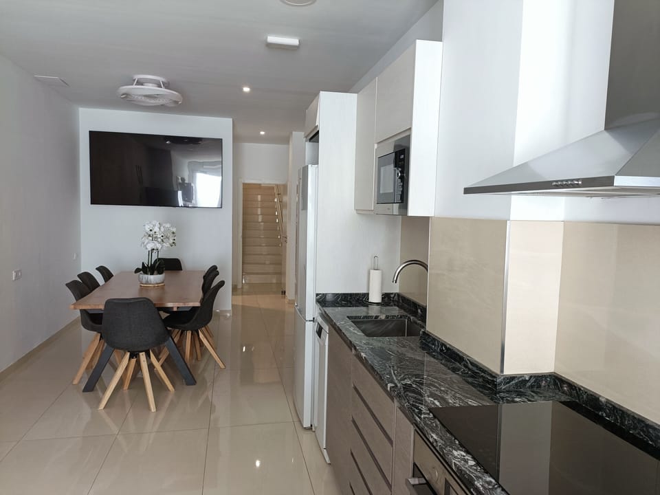 Cocina abierta al comedor.