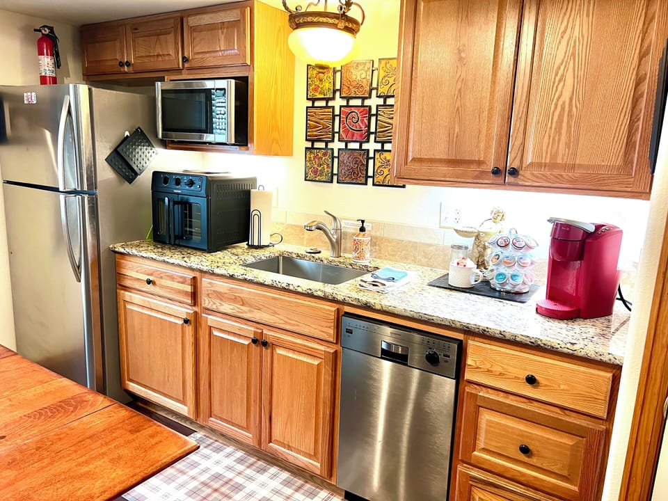 The kitchenette features many appliances to help make your stay more delicious. 