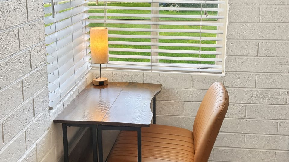 Enjoy the view of green everywhere you look at this laptop station!
