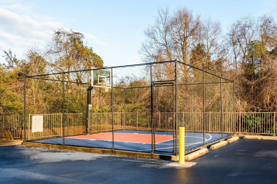 Enjoy on-site amenities such as the basketball area.