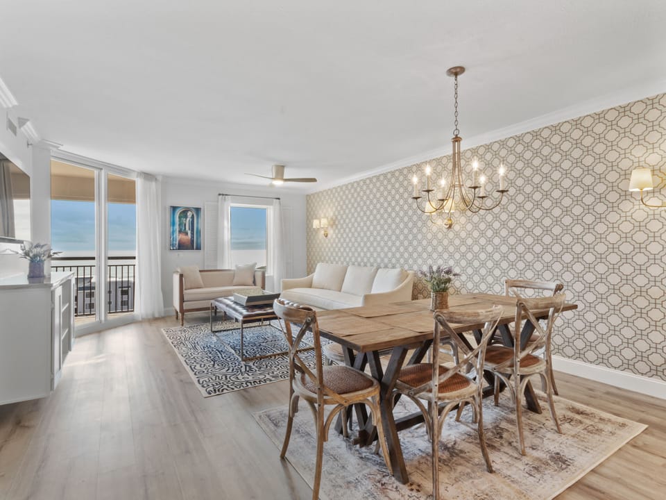 Unwind in your elegant open-concept space where coastal views meet sophisticated design—perfect for memorable meals and relaxing evenings together.