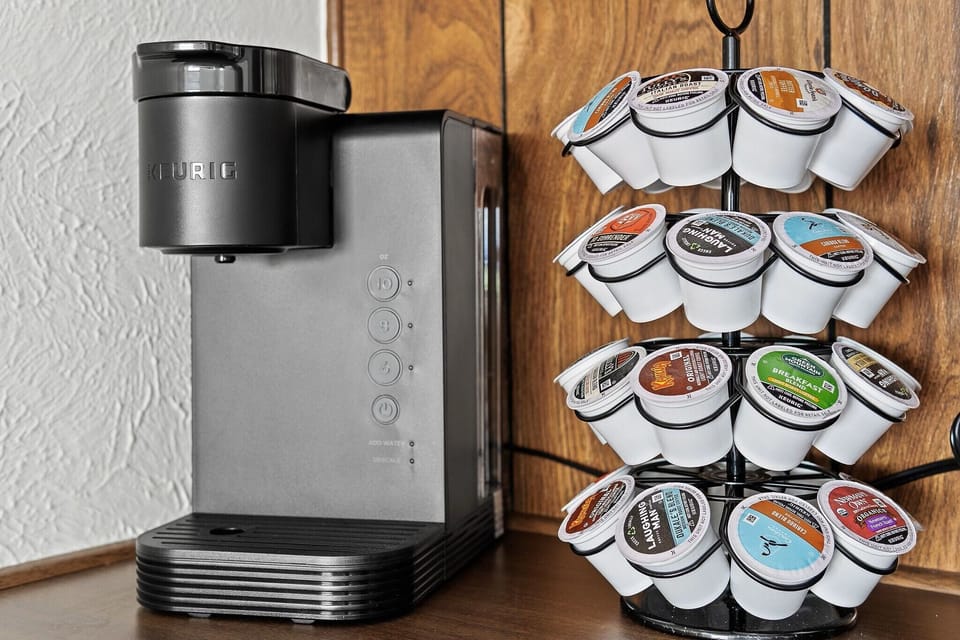 Versatile coffee maker showcasing a selection of different coffee flavors, perfect for brewing your favorite blend and enhancing your morning ritual.
